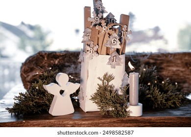 Homemade advent calendar made of cardboard. Small cardboard boxes in a paper bag decorated on rustic wood. Sustainable christmas packaging. Background for a eco friendly christmas surprise. - Powered by Shutterstock