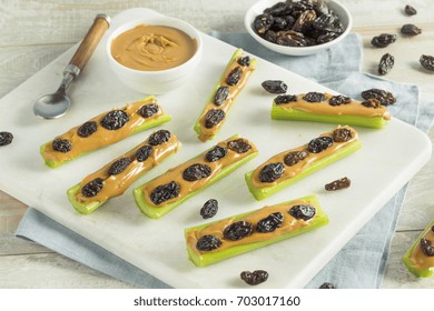 Homemade Ants On A Log Snack With Celery Peanut Butter And Raisins