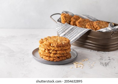 Homemade ANZAC biscuits. Traditional Australian oatmeal and coconut cookies. Space for text, close up 