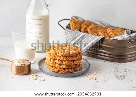 Homemade ANZAC biscuits. Traditional Australian oatmeal and coconut cookies. Space for text, close up 
