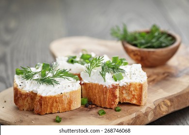 homemade appetizing crostini with soft cheese cream herbs - Powered by Shutterstock