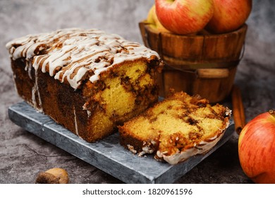 Homemade Apple Fritter Bread Drizzled With White Glaze On Fall Autumn Background, Selective Focus