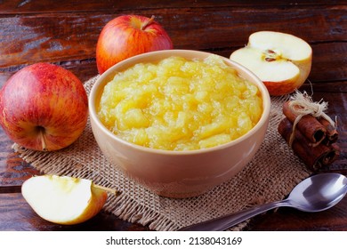 Homemade Apple Sauce Or Apple Puree In Ceramic Bowl Over Rustic Wooden Table. Top View