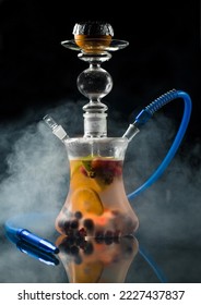 homemade arabic shisha with mixed fruits smoke  - Shutterstock ID 2227437837