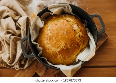 Homemade Artisan Bread Baked In A Rustic Rustic Dutch Oven Pot