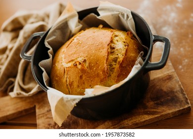 Homemade Artisan Bread Baked In A Rustic Rustic Dutch Oven Pot