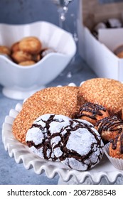 Homemade Assorted Cookie. Holiday Christmas Cookie. Chocolate Covered Cookie Dough Bites, Chocolate Crinkle Cookies And Sesame Cookies.