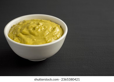 Homemade Avocado Guacamole in a Bowl, side view. Copy space. - Shutterstock ID 2365380421