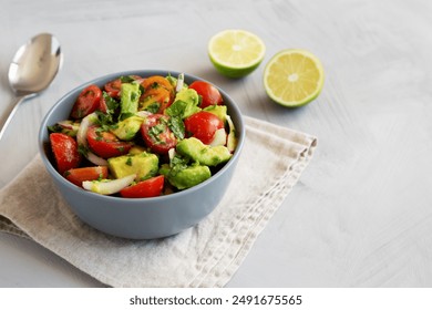 Homemade Avocado And Tomato Salad in a Bowl, side view. - Powered by Shutterstock