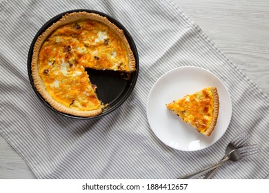 Homemade Bacon Quiche With Eggs And Cheddar Cheese, Overhead View. Flat Lay, From Above, Top View.