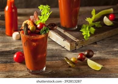 Homemade Bacon Spicy Vodka Bloody Mary with Tomatos, Olive and Celery