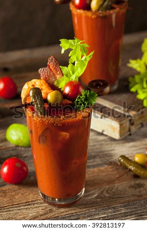 Homemade Bacon Spicy Vodka Bloody Mary with Tomatos, Olive and Celery
