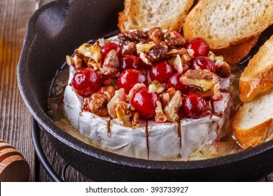 Homemade Baked Brie With Honey, Cranberry And Walnut, Selective Focus.