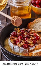 Homemade Baked Brie With Honey, Cranberry And Walnut, Selective Focus.