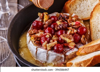 Homemade Baked Brie With Honey, Cranberry And Walnut, Selective Focus.