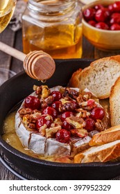 Homemade Baked Brie With Honey, Cranberry And Walnut, Selective Focus.