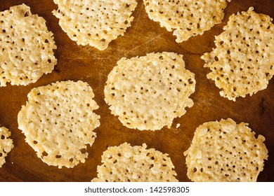 Homemade Baked Parmesan Cheese Crisp Against A Background