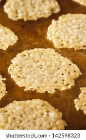 Homemade Baked Parmesan Cheese Crisp Against A Background