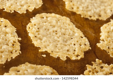 Homemade Baked Parmesan Cheese Crisp Against A Background