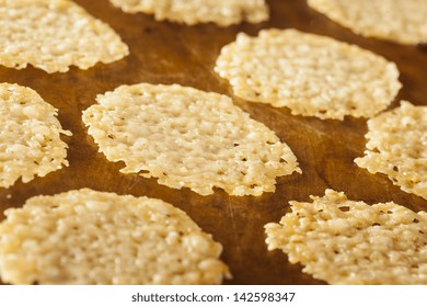 Homemade Baked Parmesan Cheese Crisp Against A Background