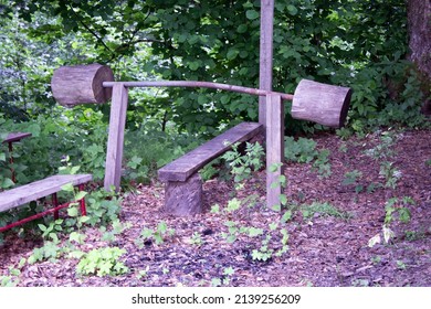 Homemade Bar For Sports In The Forest. Gym In Nature. No People. Bar From Wooden Stumps.