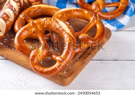  Homemade bavarian pretzels on kitchen table, traditional Oktoberfest, bavarian, German  breakfast lye bun pastry 