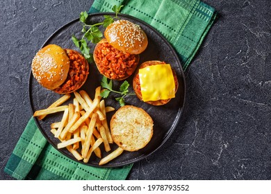 Homemade BBQ Sloppy Joe Sandwiches With French Fries On A Black Plate, Flat Lay, Free Space