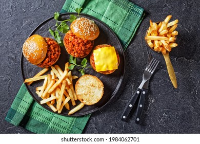 Homemade BBQ Sloppy Joe Sandwiches With French Fries On A Black Plate, Flat Lay, Free Space