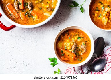 Homemade Beef Meat Soup With Carrot, Potato, Corn And Sweet Potato, Flat Lay. Winter Comfort Food Concept.