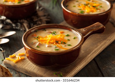 Homemade Beer Cheese Soup With Chives And Bread