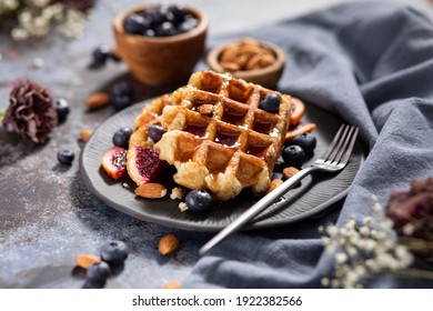 Homemade Belgium Waffles with Blueberries and Almonds