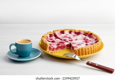 Homemade Berry Pie And Cup Of Coffee Espresso On White Wooden Table. Copyspace.