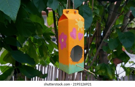 Homemade Bird Feeder in tree  Milk Carton Bird House in tree     