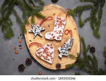 Homemade Birdseed Christmas Ornaments. Fir Tree, Heart, Star And Boot Shapes. Top View.