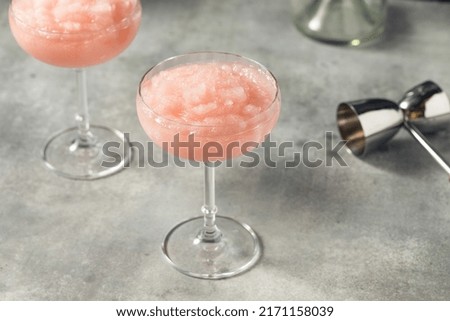 Homemade Boozy Frozen Rose Frose Slushie in a Coupe Glass