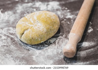 Homemade Bread Dough With Flour Over Messy Kitchen Bench Next To Rolling Pin, Concept Of Simple Natural Healthy Ingredients