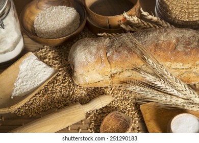 Homemade bread, wheat and kitchen utensils - Powered by Shutterstock