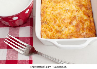 Homemade Breakfast Casserole With Cup Of Milk