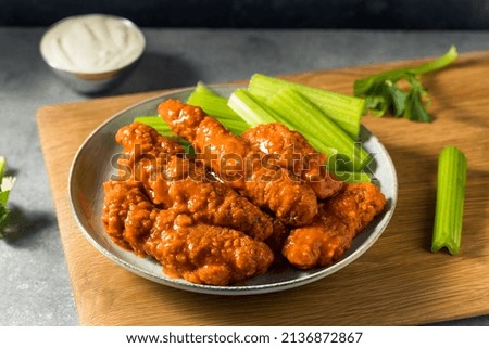 Homemade Buffalo Chicken Tenders with Celery and Blue Cheese Stock foto © 