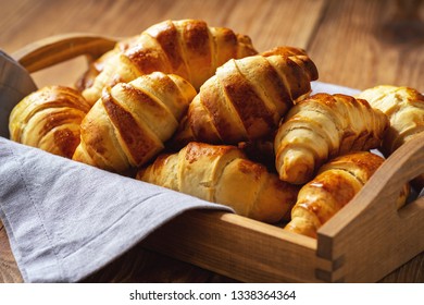 Homemade Butter Croissants On Wooden Tray.