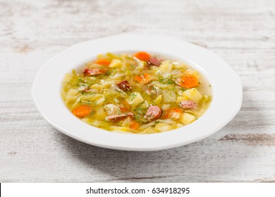 Homemade cabbage soup, cooked on smoked ribs. Front view. - Shutterstock ID 634918295