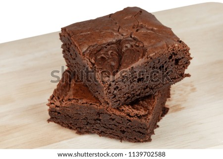 Similar – Image, Stock Photo Chocolate brownie pieces on wooden background