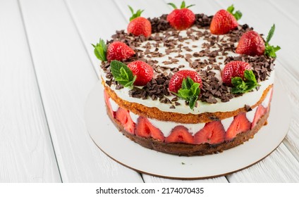Homemade cake with strawberries and chocolate - Shutterstock ID 2174070435