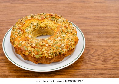 Homemade Cakes, Pumpkin Seed Muffin On White Plate. Studio Photo