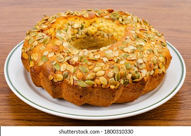 Homemade Cakes, Pumpkin Seed Muffin On White Plate. Studio Photo