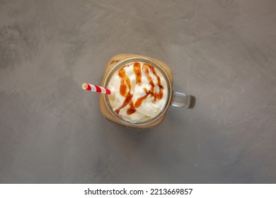  Homemade Caramel Iced Latte With Whipped Cream In A Glass Jar, Top View. Flat Lay, Overhead, From Above.