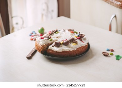 Homemade Carrot Cake With Cream Cheese And Chocolate Eggs. Easter Festive Baking, One Layer Cake.