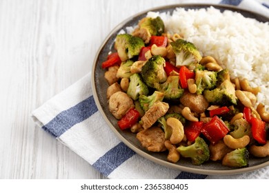 Homemade Cashew Chicken Stir-Fry on a Plate, side view. Copy space. - Shutterstock ID 2365380405