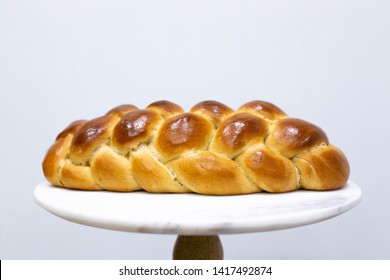Homemade challah braided bread for Shabbat traditional Jewish food design element room for text 