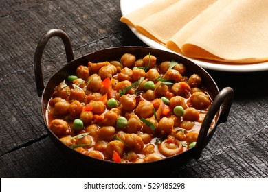  Homemade Chana Masala Served In Cast Iron Cookware, 